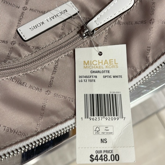 Michael Kors Charlotte Large Logo and Leather Top-Zip Tote Bag
Optic White
NWT - Picture 10 of 16